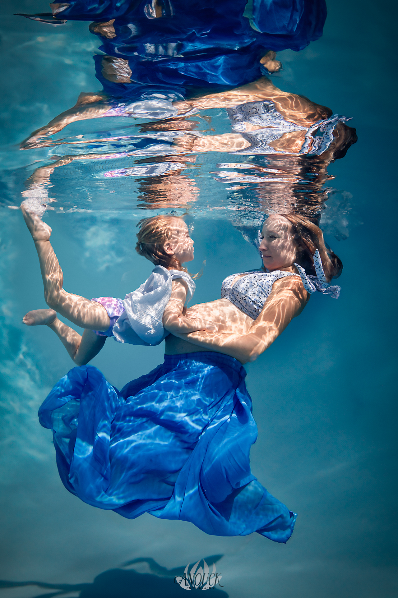 Shoot aquatique grossesse en Suisse Romande